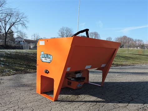 salt spreader attachment for skid steer|skid steer gravel spreader.